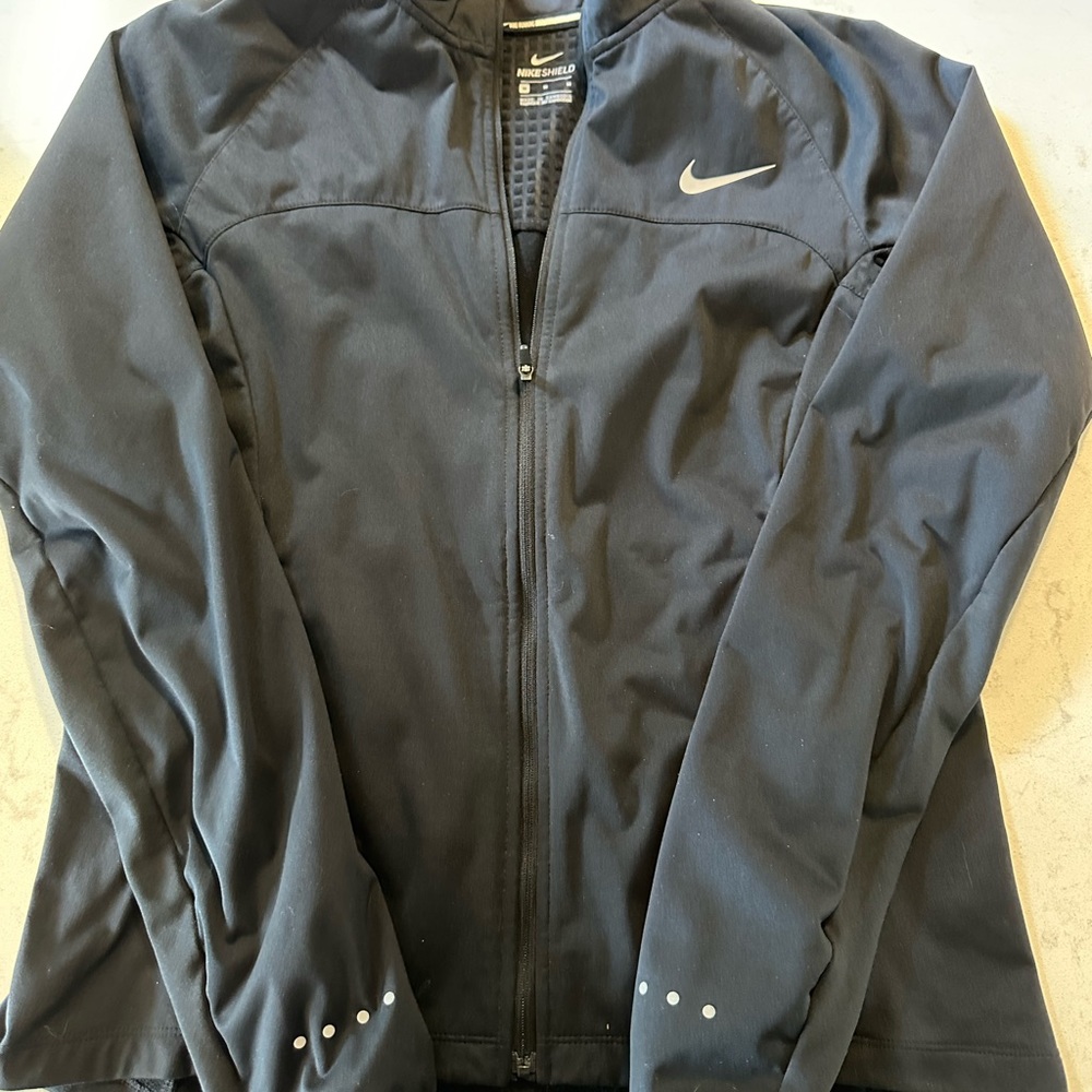 Black Nike women’s running jacket size medium